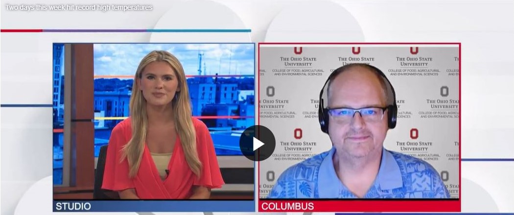 Screenshot of interview with 2 side by side images, to the left the host a woman and tot he right guest in Columbus Aaron Wilson with text stating Two days this week hit recird high temperatures 