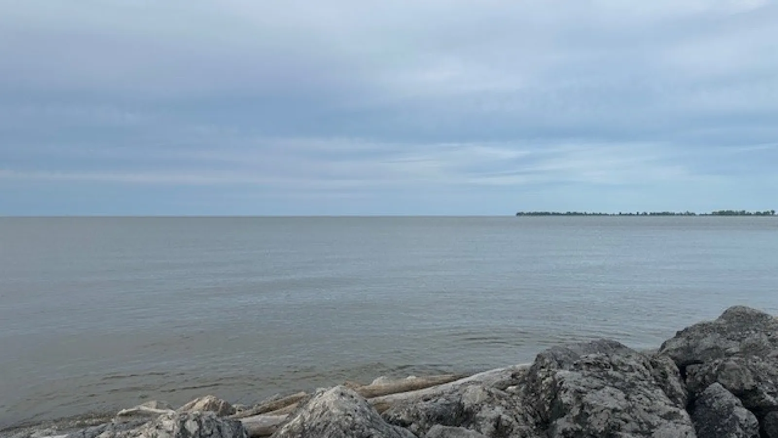 Lake Erie with rocks in the forefront.