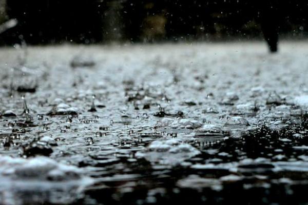Heavy rain drops on the ground.