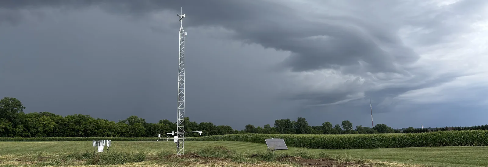 Thunderstorm approaching weather monitoring station on a farm